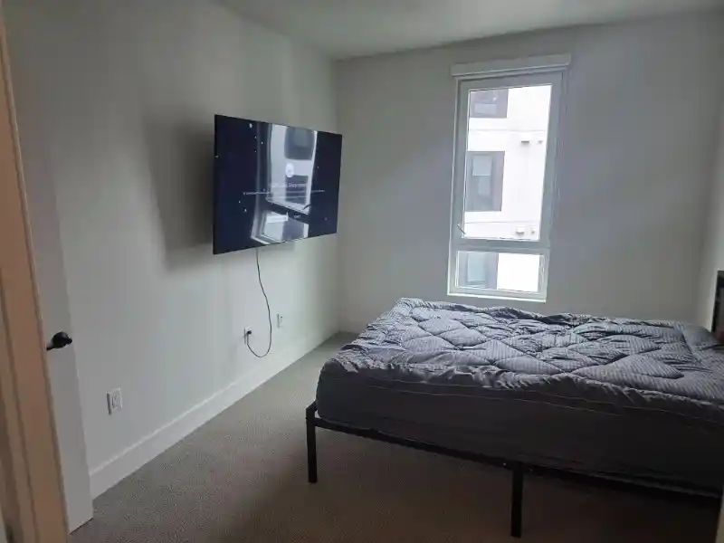 Junk removal from an upstairs Charlotte apartment with stairs elevator and long hallway access